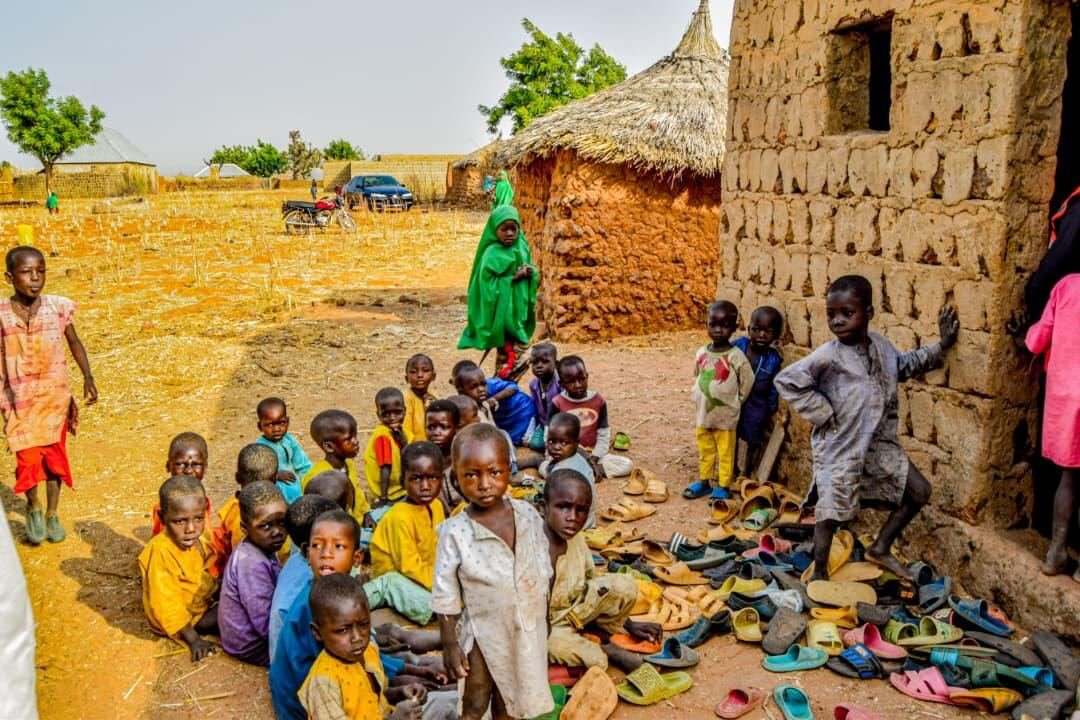 Children outside a village home
